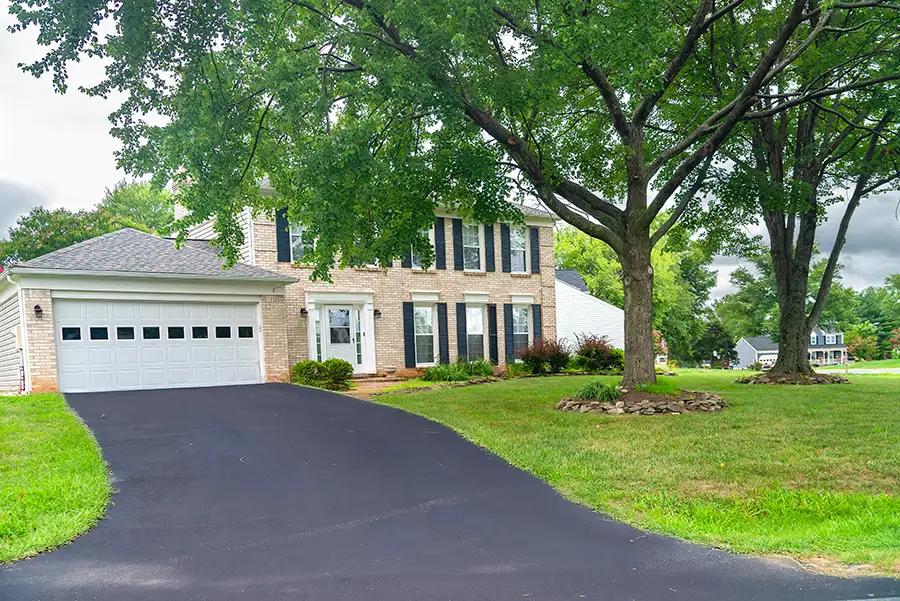 Newly paved asphalt driveway for residential home - Jacksonville, IL